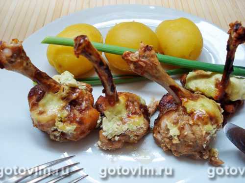 crackling chicken wings with cheese parmesan in an oven
